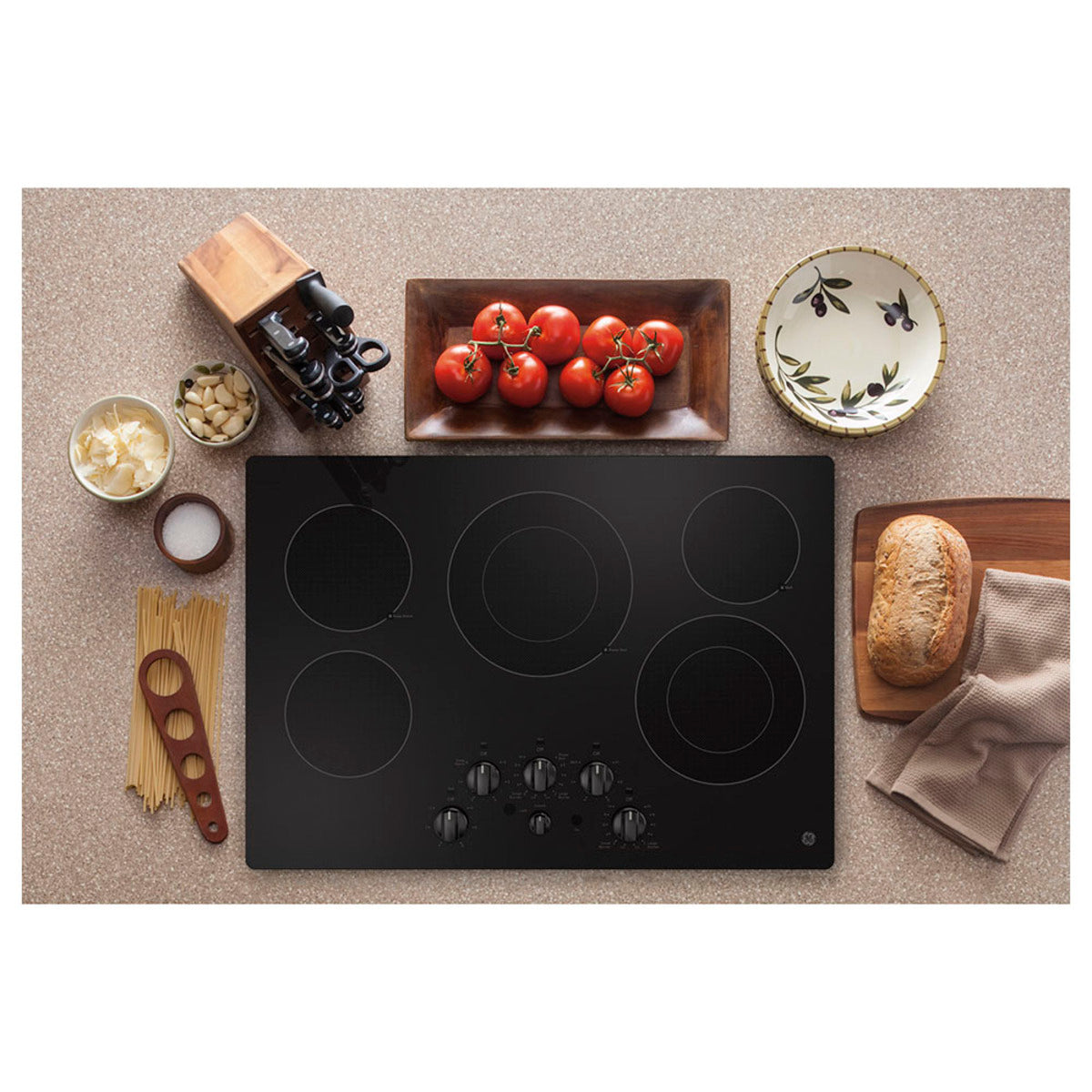 Table de cuisson électrique intégrée GE 30 po avec commande à bouton, noire - JEP5030DTBB